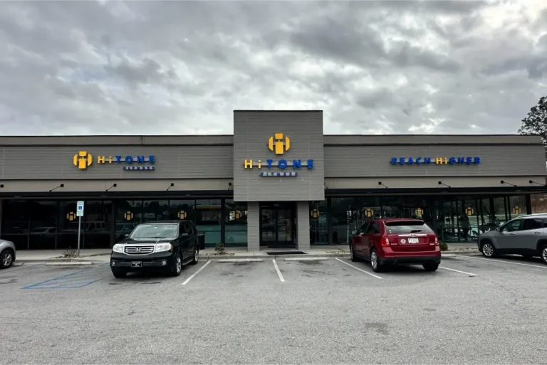 Entrance and parking lot of a HiTone gym.