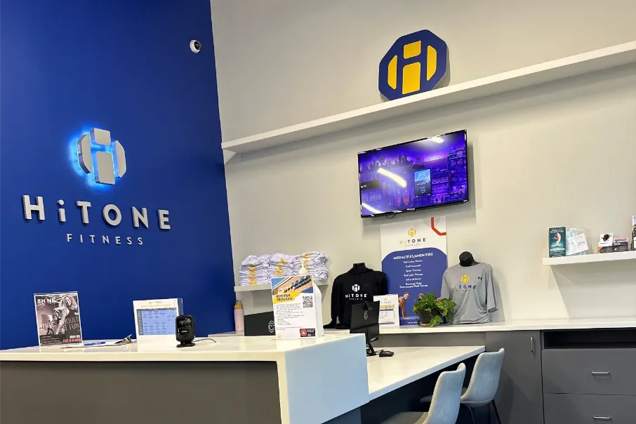 A small reception inside a Hitone Fitness Gym.