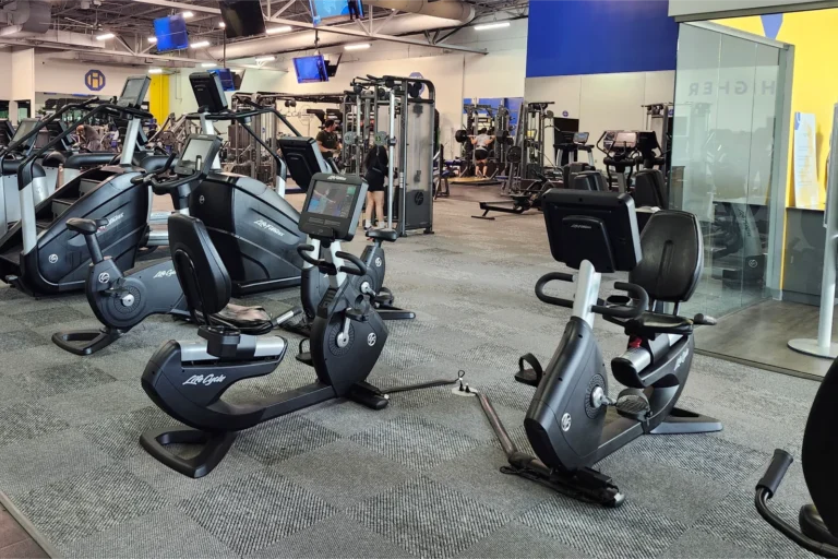 Exercise cycles and other gym equipment at a gym.